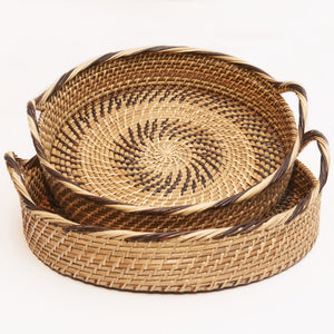 Stack of handwoven rattan trays