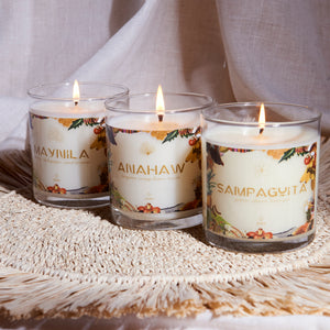 three candles in glass jars with the following scent names: Maynila, Anahaw, Sampaguita