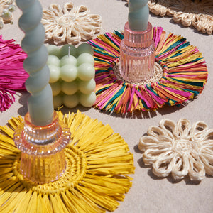 handmade coasters from the Philippines featuring natural materials like raffia and abaca